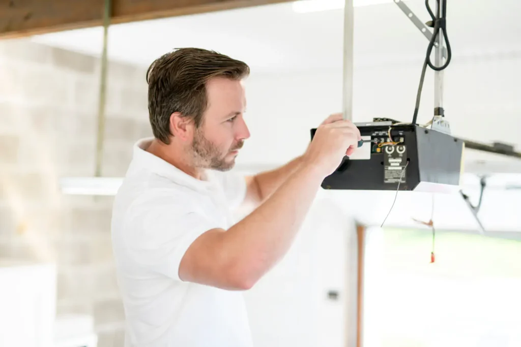 technician fixing garage opener lee county florida 1